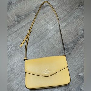 Kate Spade yellow crossbody, 5.68 height, 8.64 width, 1.84 deep, strap 22”